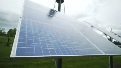 Close up of a solar panel on a cloudy day Stock Footage 130799609
