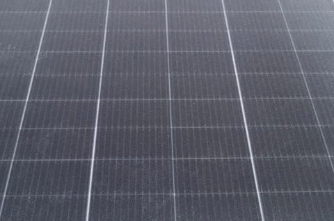 Close-up of solar panel surface with frost accumulation, highlighting winte.. Stock Photos
