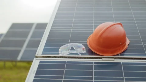 Close up of solar panels established in rows on field. Huge farm with cells that Stock Footage 168526197