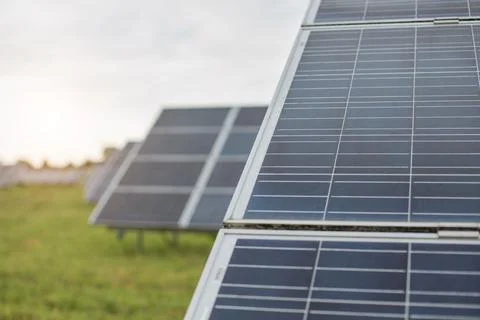 Close up of solar panels standing in rows on station Stock Photos