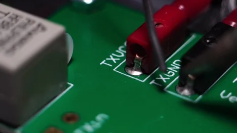 Close up of soldering chip to board with iron  스톡 동영상 125733544