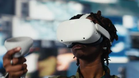 Close up of soldier providing combat support using VR goggles Stock Photos