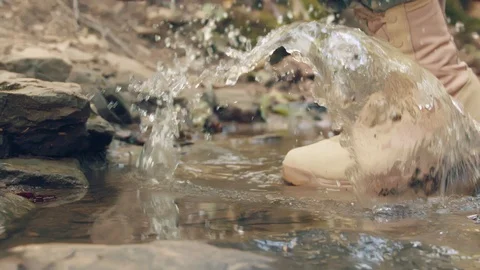 Close Up Of A Soldier's Boot Running Through Water Stock Footage 87430089
