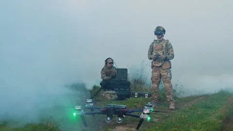 Close up of soldiers using laptop computer for surveillance during military Stock Footage 242424077