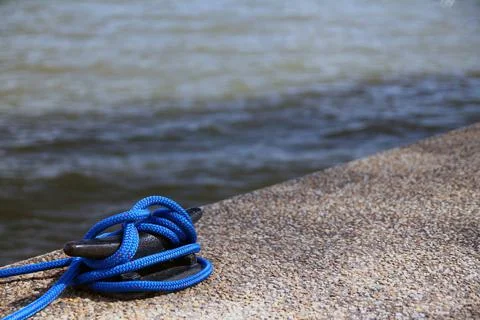 Close up of a solid blue electric sailor's knot Stock Photos