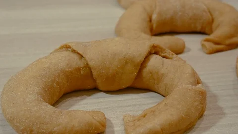 Close-up of some raw croissants on the table Video stock 87615962