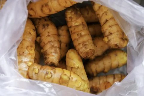 Close-up of some turmeric in plastic Stock Photos