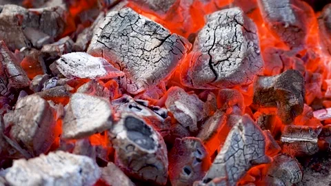 A Close Up of some Very Hot Charcoal Burning in a Grill Stock Footage 231720626