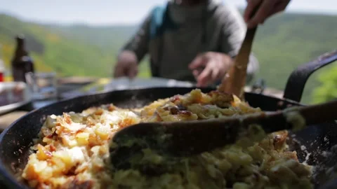 Close up on someone cooking and serving a dish Stock Footage 131305820