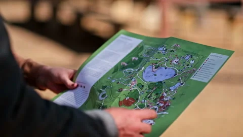 Close up of someone holding a map Stock Footage 240924345