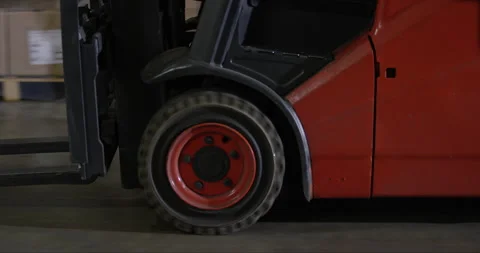Close Up Of Someone Lifting Boxes With Forklift Stock Footage 142891946