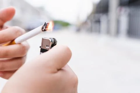 Close-up of someone light a cigarette. World no tobacco day concept Stock Photos