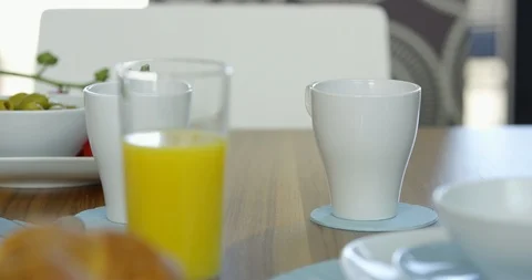 Close Up Of Someone Pouring Hot Coffee Into Mug Stock Footage 124046278