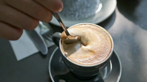Close up of someone stirring coffee Stock Footage 240917402