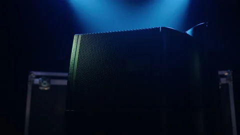 Close-up of a sound column against the background of a flickering concert light Stock Footage 194438767