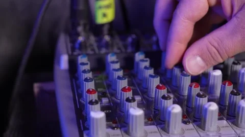 Close-up of sound mixer console in recording studio. Male hands Stock Footage 265851669