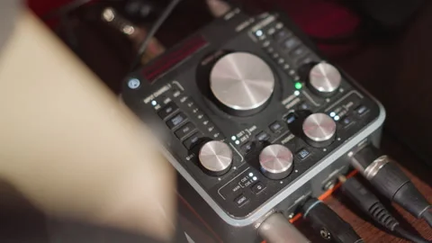 Close-Up of Sound Mixer with Knobs and Dials in a Recording Studio 스톡 동영상 284367923
