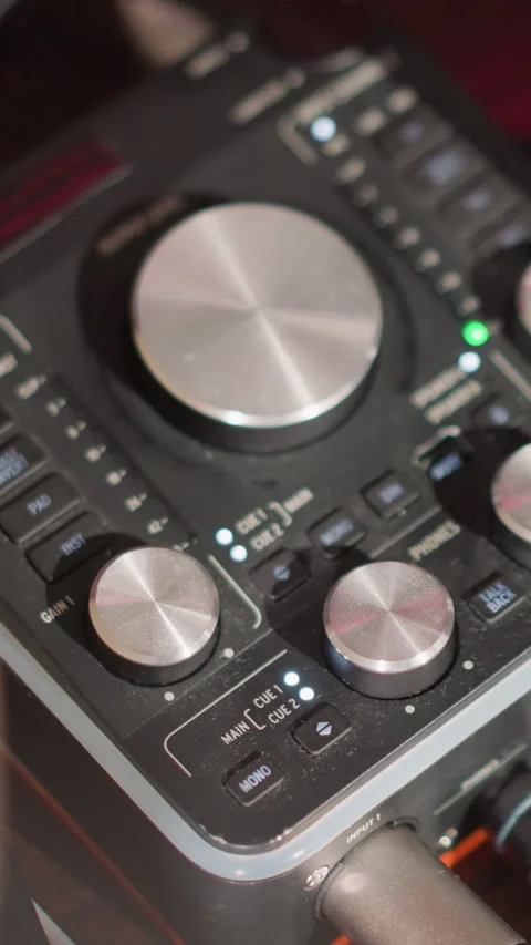 Close-Up of Sound Mixer with Knobs and Dials in a Recording Studio Stock Footage 309710498