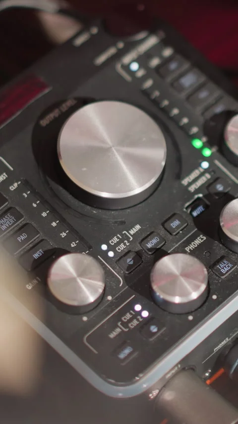 Close-Up of Sound Mixer with Knobs and Dials in a Recording Studio 스톡 동영상 309710547