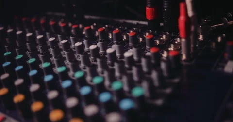 Close-up of sound mixer with volume knobs in music studio Stock Footage 90232549