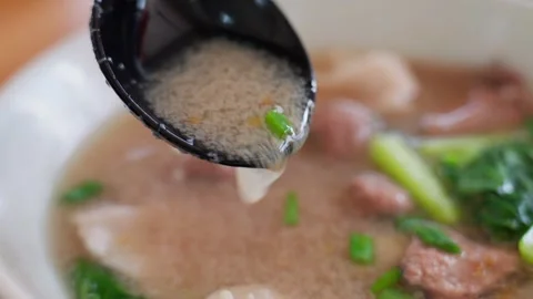 Close up the soup base of Pork Offal Soup (Sabah Sheng Rou Mian) Stock Footage 300848213