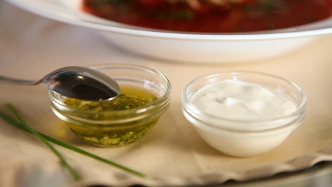 Close-up of Soup from beetroot Borsch with meat and finely chopped greens Stock Footage 124834885