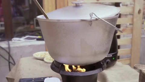 Close-up of a soup boiling in a pot on the open air Video stock 171915657