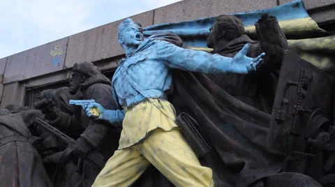 Close-up of a Soviet monument in Sofia painted in colours of Ukraine Stock Footage 35527594