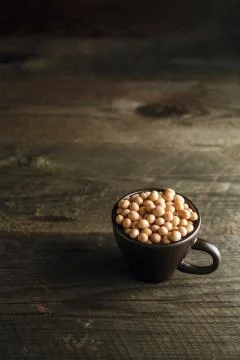 Close up soy beans in cup Stock Photos