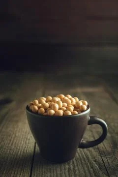 Close up soy beans in cup Stock Photos
