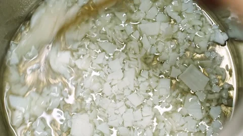 Close-up. Soy Wax Flakes Melt In A Saucepan Stock Footage 300660747