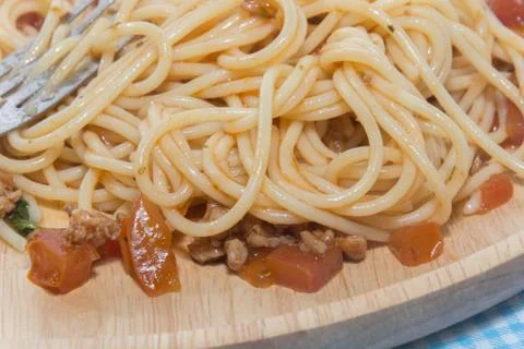 Close up of spaghetti with sauce and fork Stock Photos