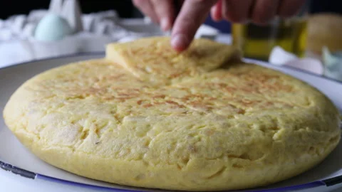 Close up of Spanish omelette. Cutting a portion Stock Footage 197481634