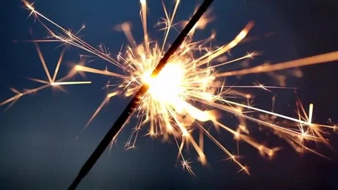Close-up of Sparkler Burning with Glowing Fireworks Stock Footage 301424129