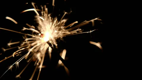 Close up of a sparkler burning at night Video stock 154473047