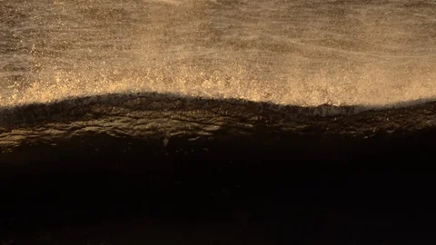 Close up of the sparkling wave at sunset Video stock 94681515