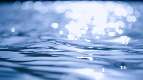 Close-up of sparkling waves on the surface of the lake 스톡 동영상 257294553