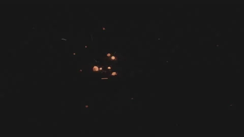 Close-up of Sparks and flashes fly caused by metal welding falling on ground. 動画素材 180918849
