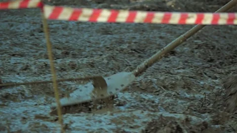 A close-up of a specially designed anchor used to pull an SUV out of the mud Stock Footage 344876193