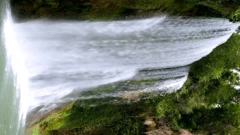 Close-up of a spectacular waterfall. Video in vertical format. 4K. Stock Footage 290518341