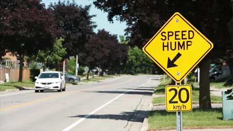 close on speed hump arrow 20 km/h sign i... | Stock Video | Pond5