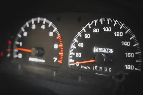 Close-up of a speedometer and tachometer in a used car Stock Photos