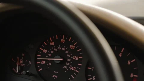 Close up of speedometer mph gauge of car accelerating 스톡 동영상 246693208