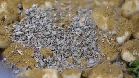 Close-up of Spices and Dried Herbs Sprinkled Over Food Video stock 332810196