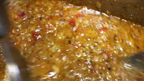 Close-up of Spicy Red Sauce Simmering in a Pot Stock Footage 337440856