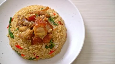 Close-up of spicy vegetable fried rice on white plate Stock Photos