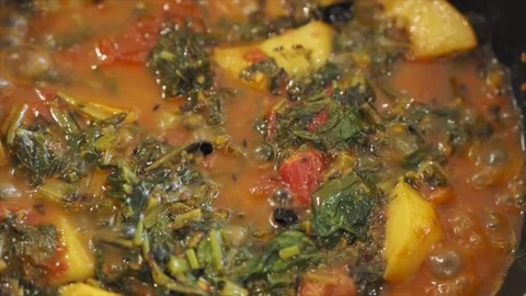 Close Up Of A Spinach Curry Being Cooked, London, UK Stock Footage 133119874
