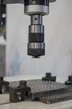 Close up spindle of a drill / Tapping machine and blank table Stock Photos