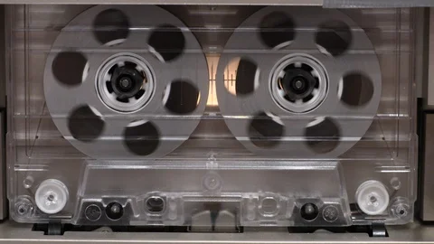 Close-up of spinning cassette wheels on playing tape Stock Footage 121168490