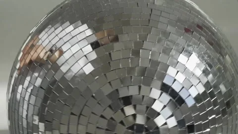 Close-up of spinning glitter disco ball Video HD Stock Footage
